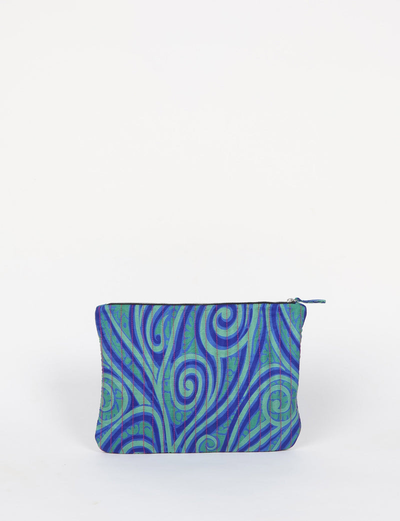 Quilted pouch with blue and green abstract swirl pattern, red vertical stitching, and top zipper closure, front view