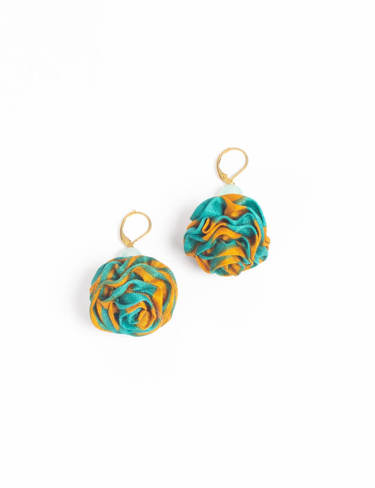 Elevate your style with our Ruffle Earrings, adorned with unique ruffle ball florets crafted from upcycled Indian saris using the traditional Aari embroidery technique. These sustainable earrings feature two glass beads and nickel-free, hypoallergenic metal hooks. Embrace ethical and green fashion with these statement pieces.