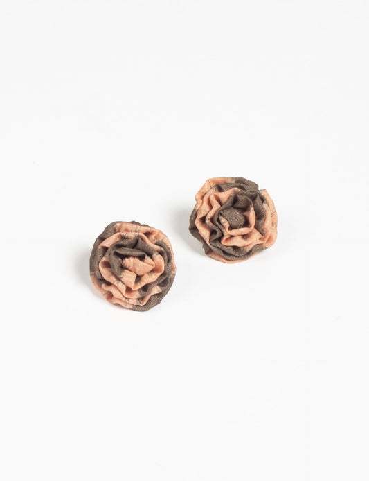 Elevate your elegance with Ruffle Earrings, delicate fabric studs showcasing Indian Aari embroidery. These eco-friendly earrings feature intricate floral patterns, embodying ethical and green fashion. Hypoallergenic and skin-friendly, our studs make a stylish statement in sustainable accessorizing."




