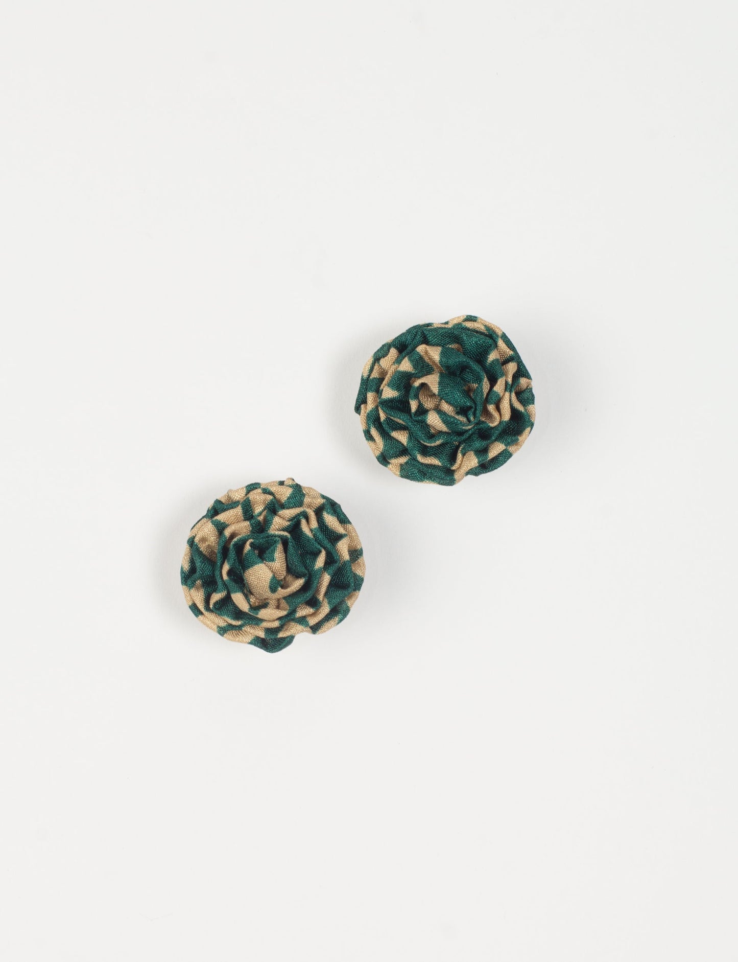 Elevate your elegance with Ruffle Earrings, delicate fabric studs showcasing Indian Aari embroidery. These eco-friendly earrings feature intricate floral patterns, embodying ethical and green fashion. Hypoallergenic and skin-friendly, our studs make a stylish statement in sustainable accessorizing."




