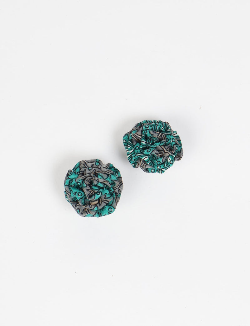 Pair of blue and gray abstract patterned fabric ruffle earrings with nickel-safe studs, shown flat on white background