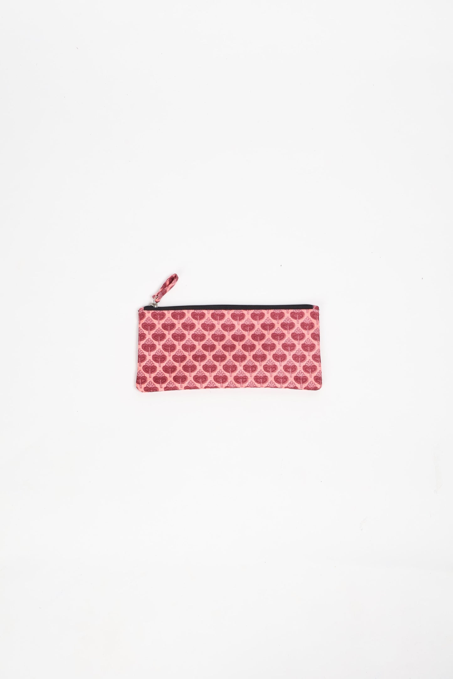 Eco-conscious quilted pencil pouch with waterproof lining made from upcycled garments, reflecting the values of circular fashion, carbon neutral fashion, and repurposed clothing. A perfect example of green fashion and sustainable women's clothing.