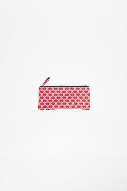 Eco-conscious quilted pencil pouch with waterproof lining made from upcycled garments, reflecting the values of circular fashion, carbon neutral fashion, and repurposed clothing. A perfect example of green fashion and sustainable women's clothing.