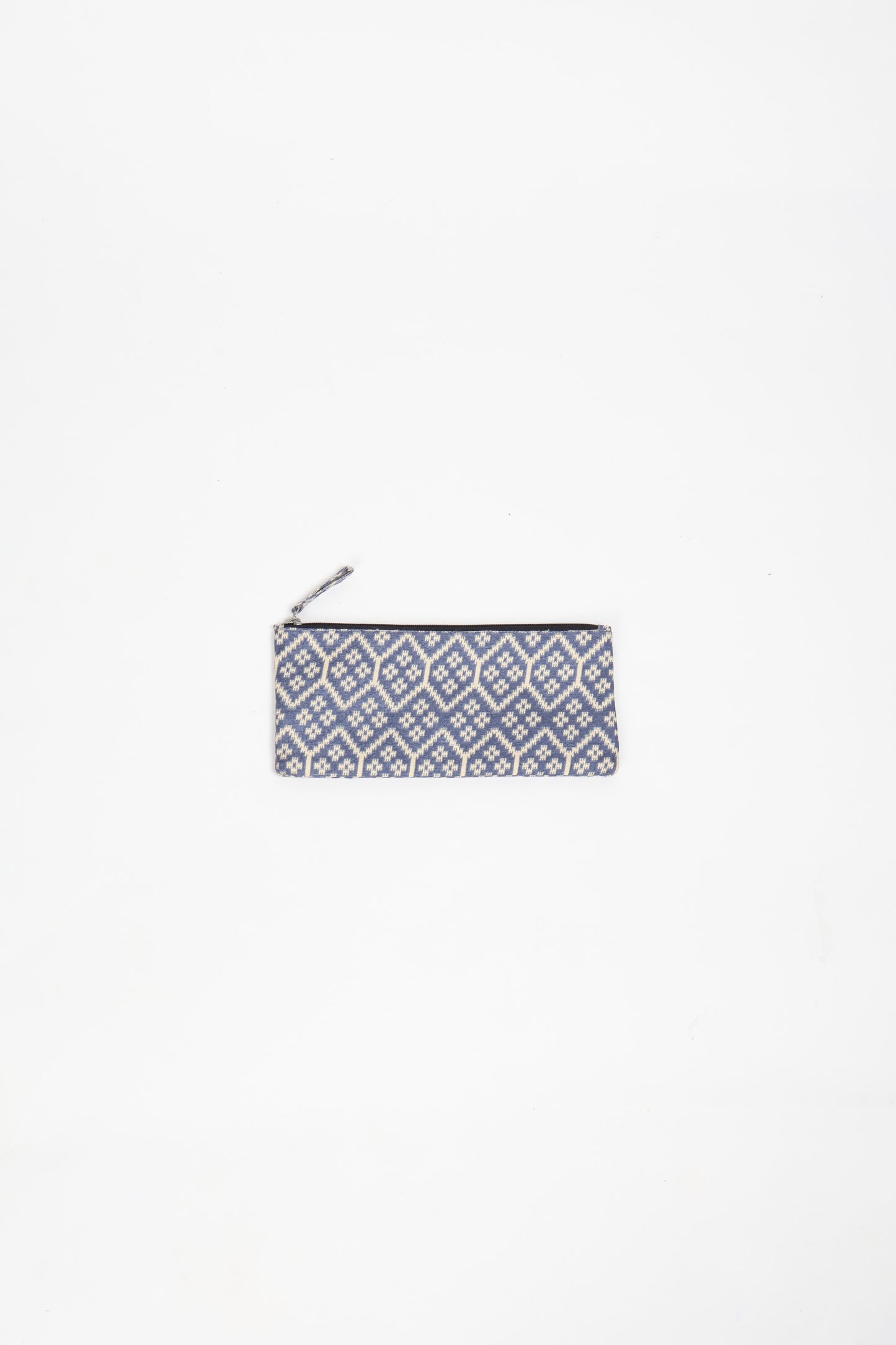 Eco-conscious quilted pencil pouch with waterproof lining made from upcycled garments, reflecting the values of circular fashion, carbon neutral fashion, and repurposed clothing. A perfect example of green fashion and sustainable women's clothing.
