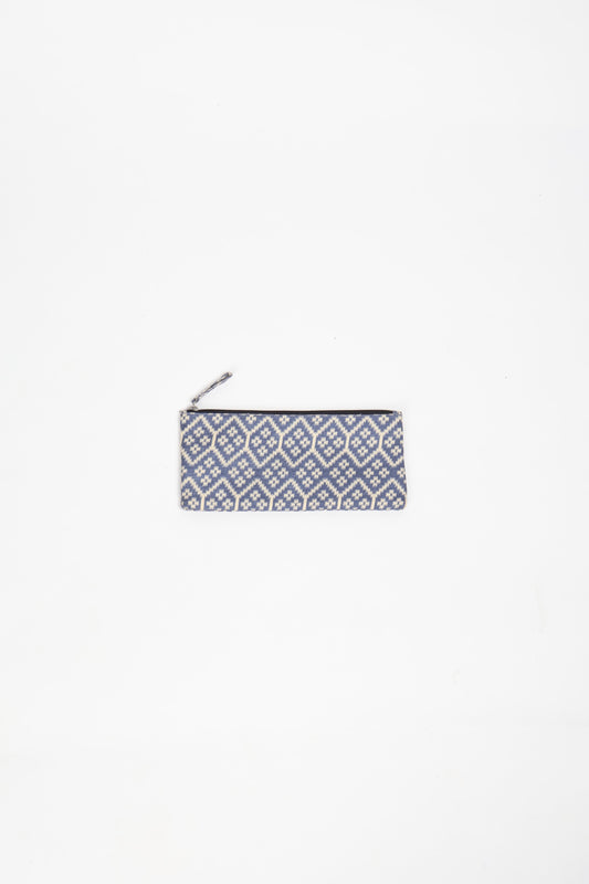 Eco-conscious quilted pencil pouch with waterproof lining made from upcycled garments, reflecting the values of circular fashion, carbon neutral fashion, and repurposed clothing. A perfect example of green fashion and sustainable women's clothing.