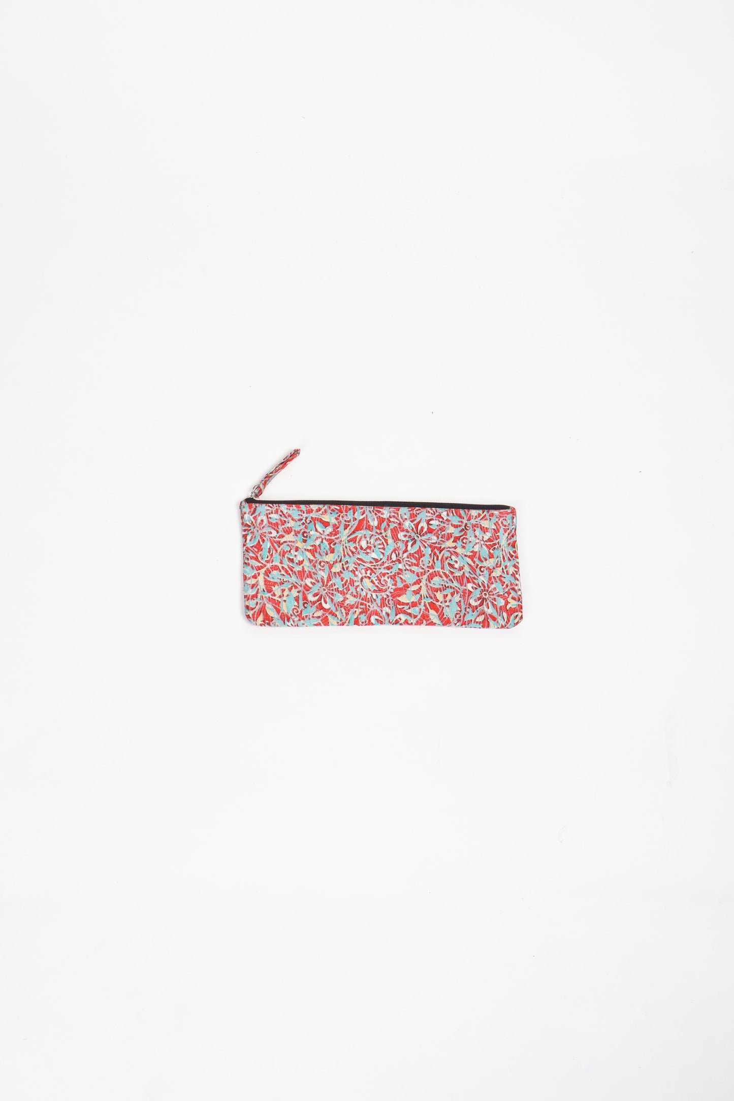 Eco-conscious quilted pencil pouch with waterproof lining made from upcycled garments, reflecting the values of circular fashion, carbon neutral fashion, and repurposed clothing. A perfect example of green fashion and sustainable women's clothing.