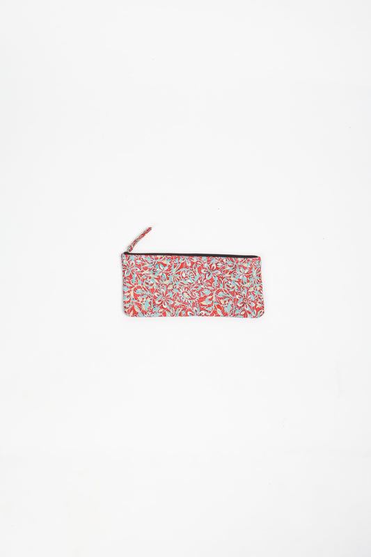Eco-conscious quilted pencil pouch with waterproof lining made from upcycled garments, reflecting the values of circular fashion, carbon neutral fashion, and repurposed clothing. A perfect example of green fashion and sustainable women's clothing.