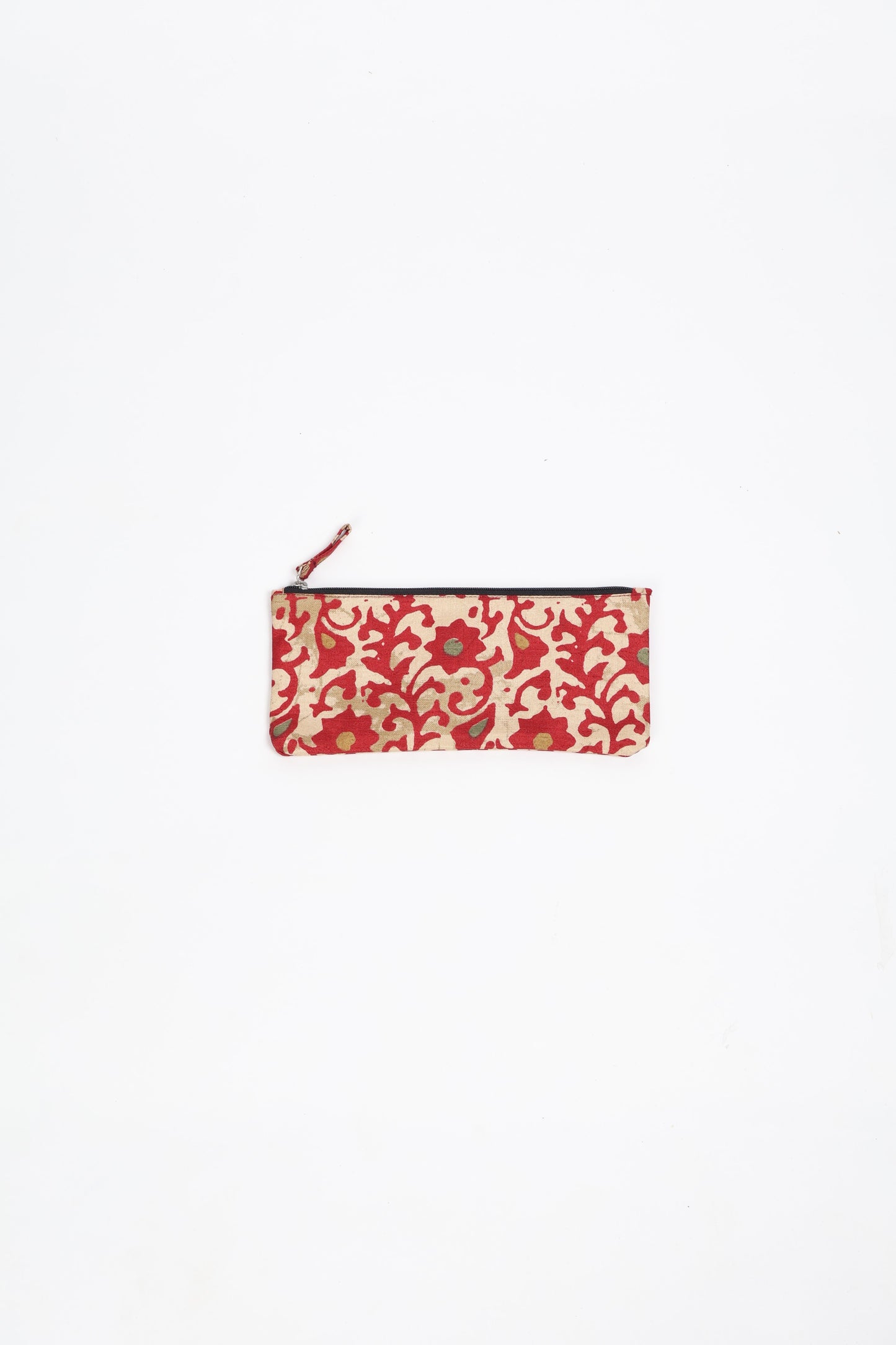 Eco-conscious quilted pencil pouch with waterproof lining made from upcycled garments, reflecting the values of circular fashion, carbon neutral fashion, and repurposed clothing. A perfect example of green fashion and sustainable women's clothing.