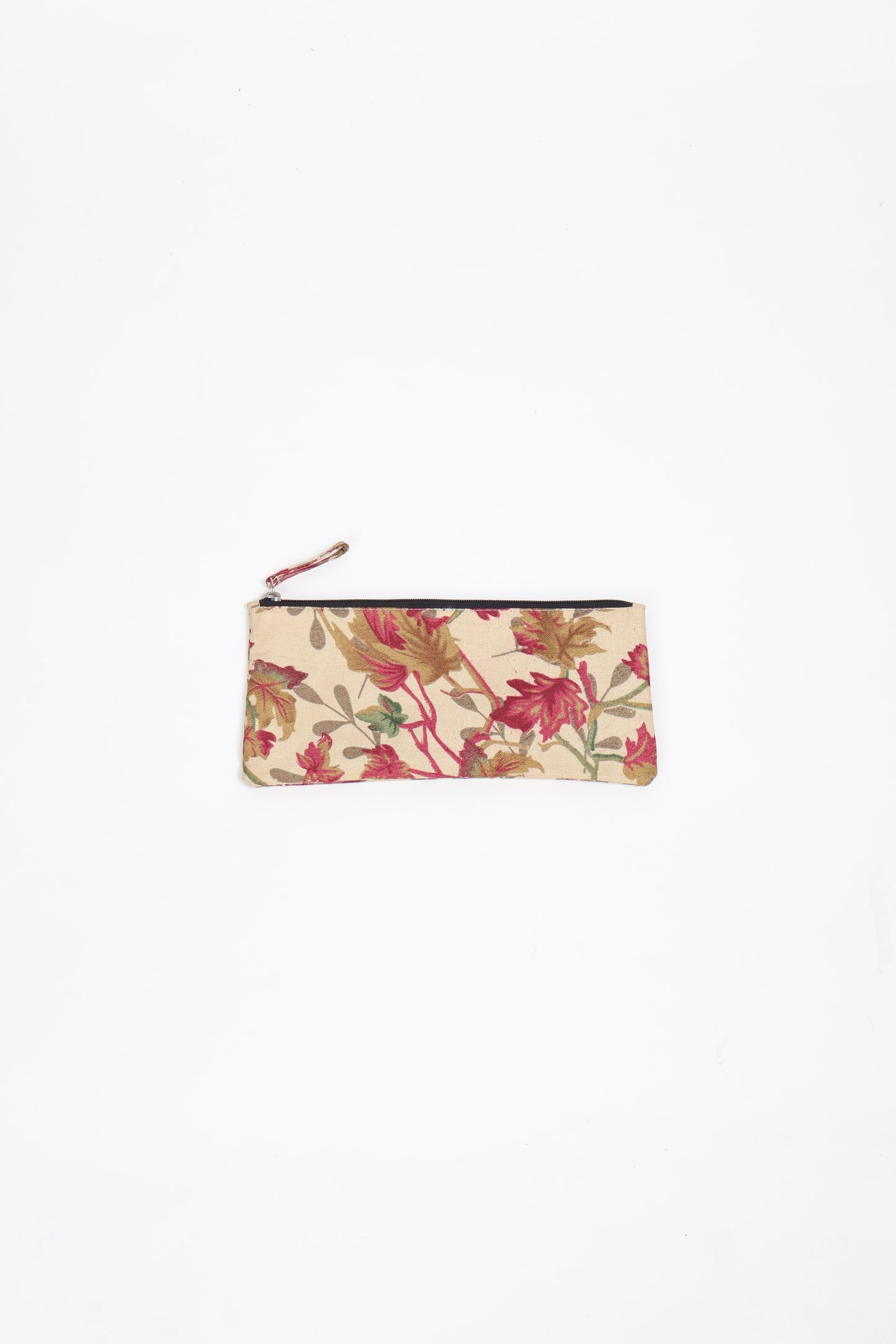 Eco-conscious quilted pencil pouch with waterproof lining made from upcycled garments, reflecting the values of circular fashion, carbon neutral fashion, and repurposed clothing. A perfect example of green fashion and sustainable women's clothing.