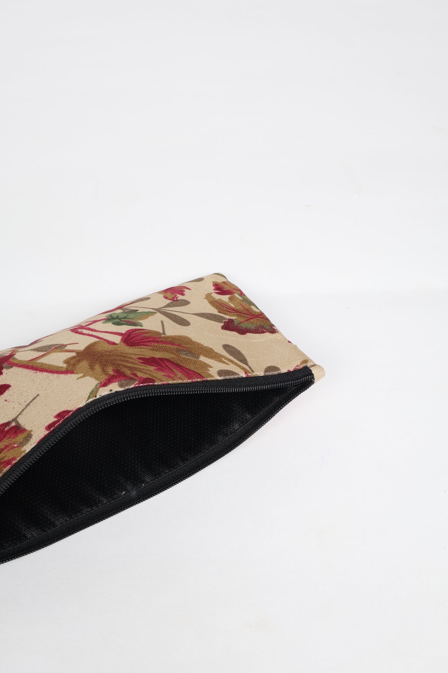 Eco-conscious quilted pencil pouch with waterproof lining made from upcycled garments, reflecting the values of circular fashion, carbon neutral fashion, and repurposed clothing. A perfect example of green fashion and sustainable women's clothing.