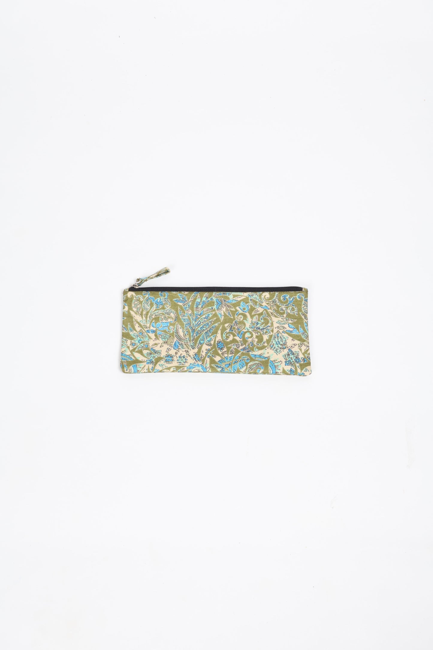 Eco-conscious quilted pencil pouch with waterproof lining made from upcycled garments, reflecting the values of circular fashion, carbon neutral fashion, and repurposed clothing. A perfect example of green fashion and sustainable women's clothing.