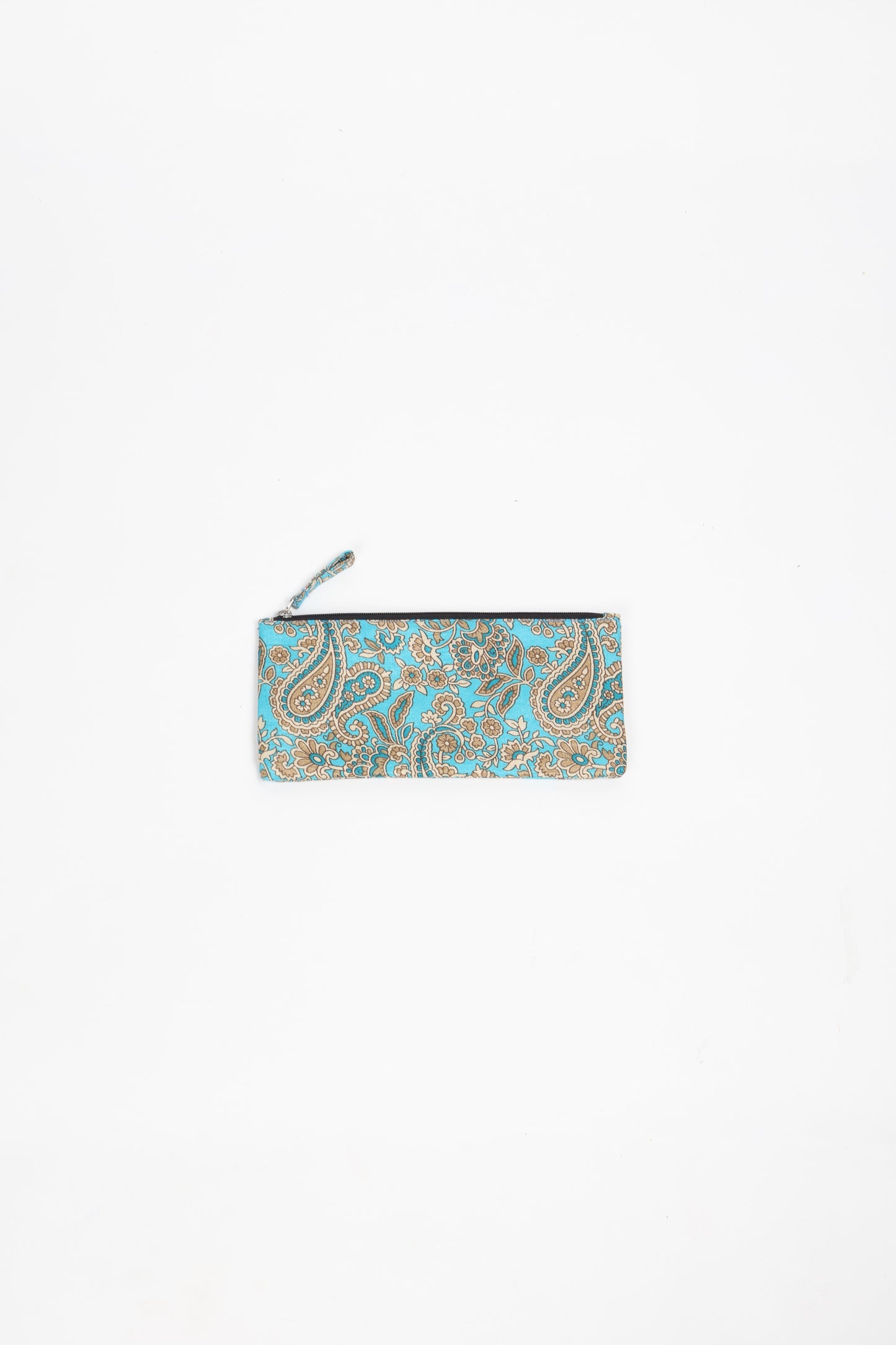 Eco-conscious quilted pencil pouch with waterproof lining made from upcycled garments, reflecting the values of circular fashion, carbon neutral fashion, and repurposed clothing. A perfect example of green fashion and sustainable women's clothing.