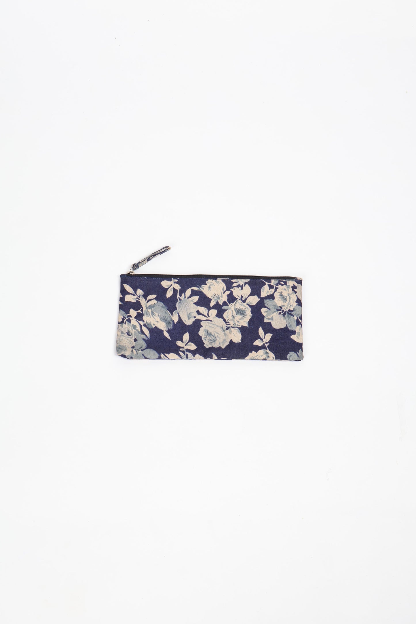 Eco-conscious quilted pencil pouch with waterproof lining made from upcycled garments, reflecting the values of circular fashion, carbon neutral fashion, and repurposed clothing. A perfect example of green fashion and sustainable women's clothing.