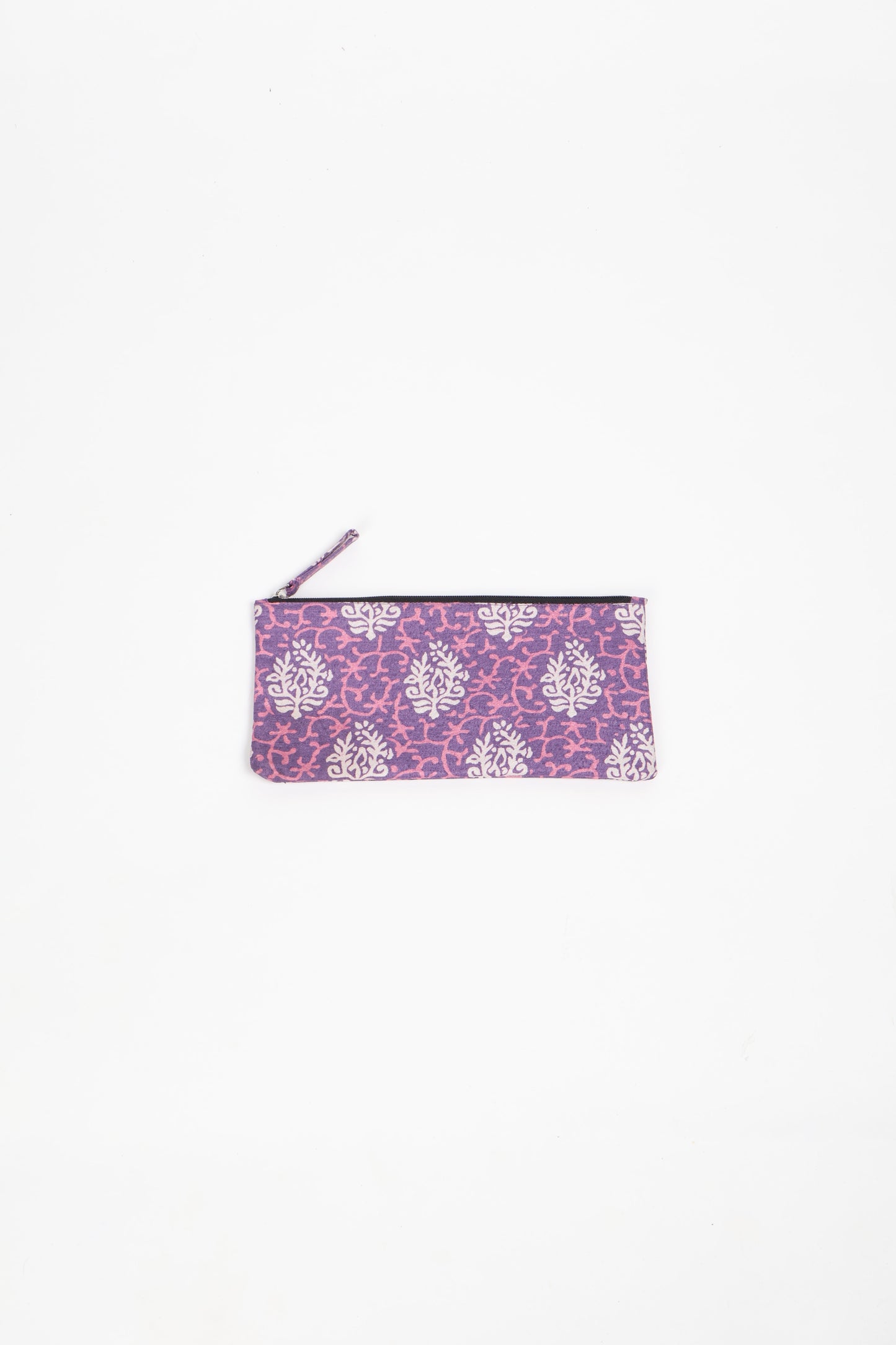 Eco-conscious quilted pencil pouch with waterproof lining made from upcycled garments, reflecting the values of circular fashion, carbon neutral fashion, and repurposed clothing. A perfect example of green fashion and sustainable women's clothing.