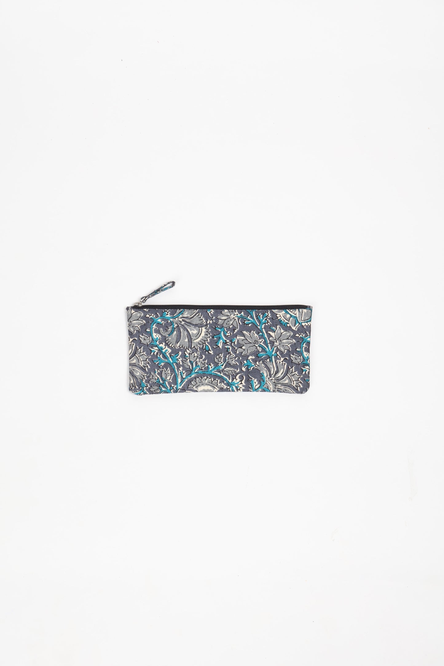 Eco-conscious quilted pencil pouch with waterproof lining made from upcycled garments, reflecting the values of circular fashion, carbon neutral fashion, and repurposed clothing. A perfect example of green fashion and sustainable women's clothing.