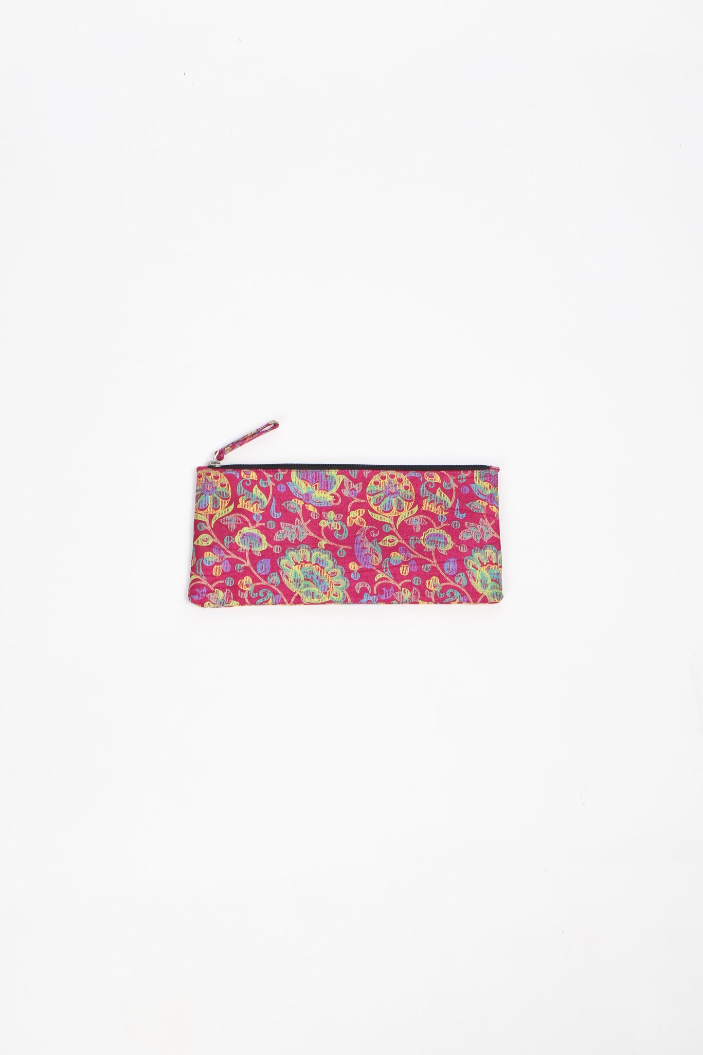 Eco-conscious quilted pencil pouch with waterproof lining made from upcycled garments, reflecting the values of circular fashion, carbon neutral fashion, and repurposed clothing. A perfect example of green fashion and sustainable women's clothing.