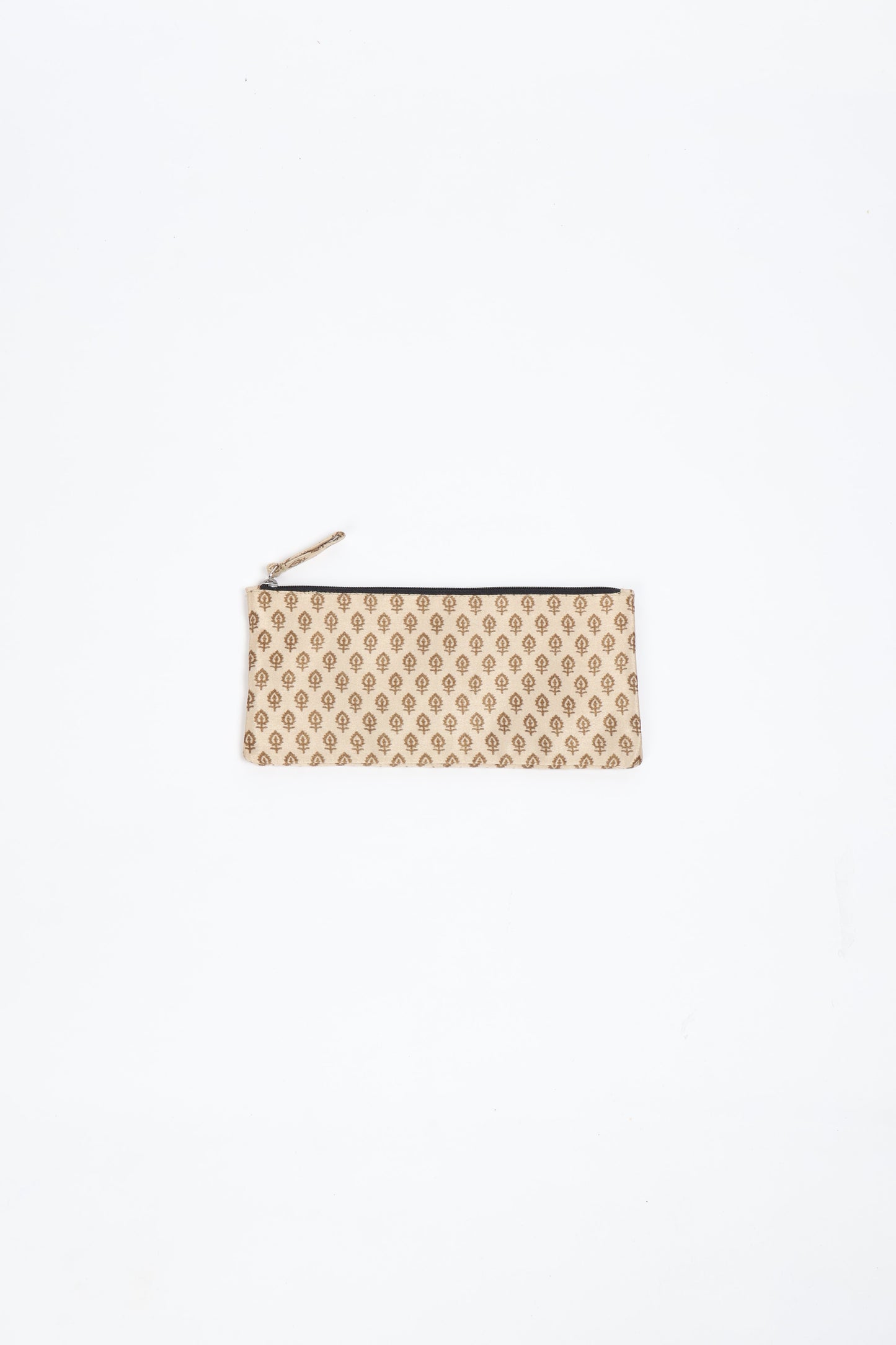 Eco-conscious quilted pencil pouch with waterproof lining made from upcycled garments, reflecting the values of circular fashion, carbon neutral fashion, and repurposed clothing. A perfect example of green fashion and sustainable women's clothing.