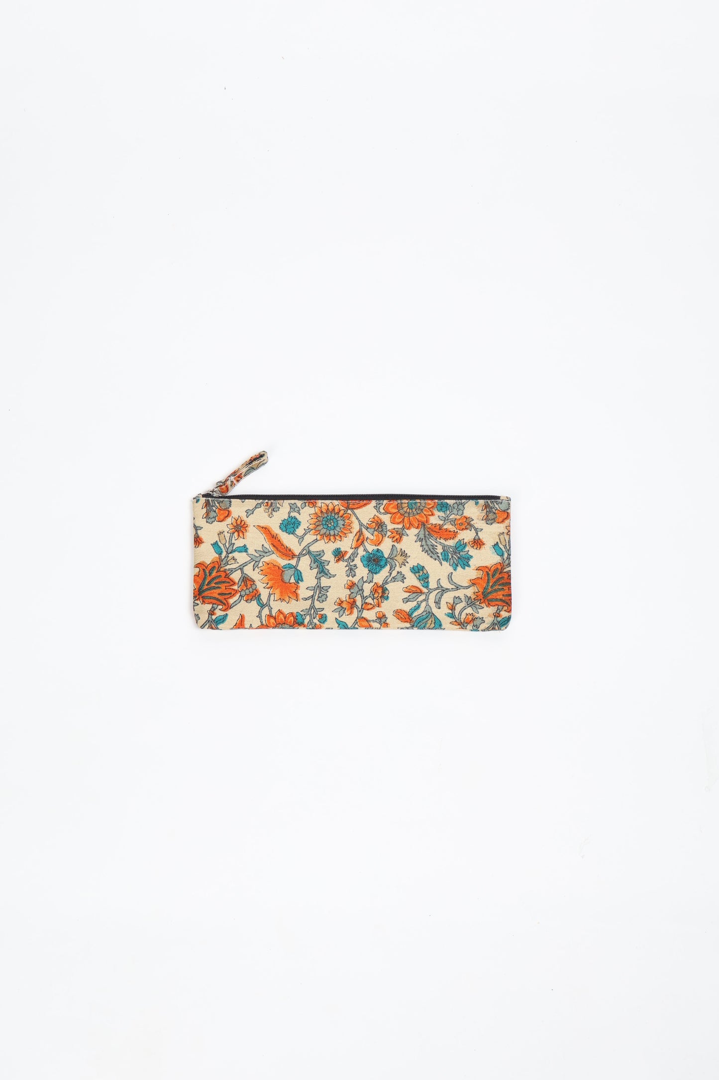 Eco-conscious quilted pencil pouch with waterproof lining made from upcycled garments, reflecting the values of circular fashion, carbon neutral fashion, and repurposed clothing. A perfect example of green fashion and sustainable women's clothing.