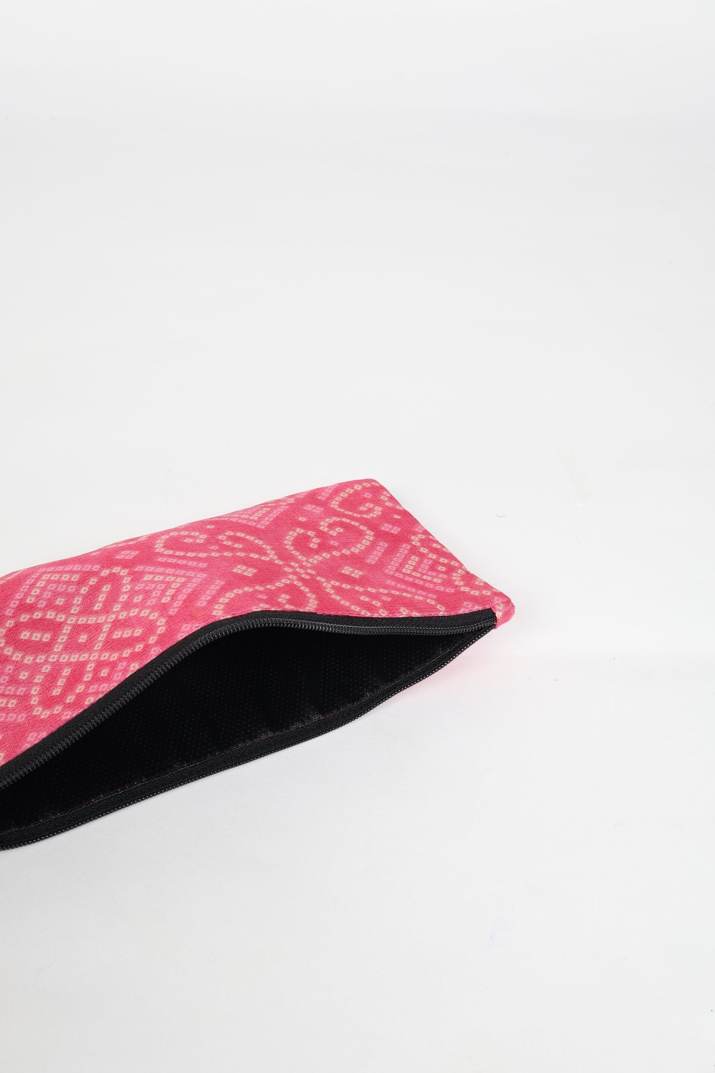 Eco-conscious quilted pencil pouch with waterproof lining made from upcycled garments, reflecting the values of circular fashion, carbon neutral fashion, and repurposed clothing. A perfect example of green fashion and sustainable women's clothing.
