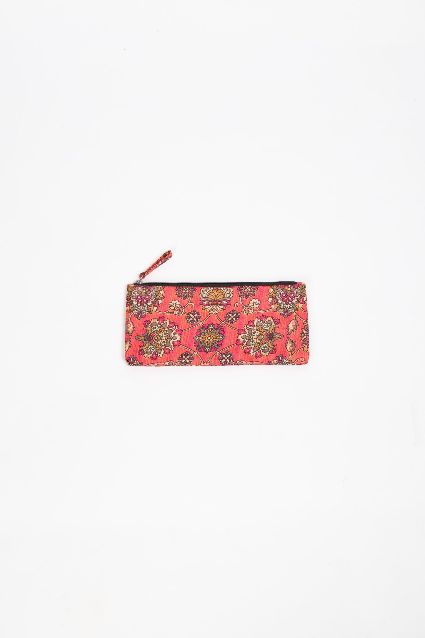 Eco-conscious quilted pencil pouch with waterproof lining made from upcycled garments, reflecting the values of circular fashion, carbon neutral fashion, and repurposed clothing. A perfect example of green fashion and sustainable women's clothing.