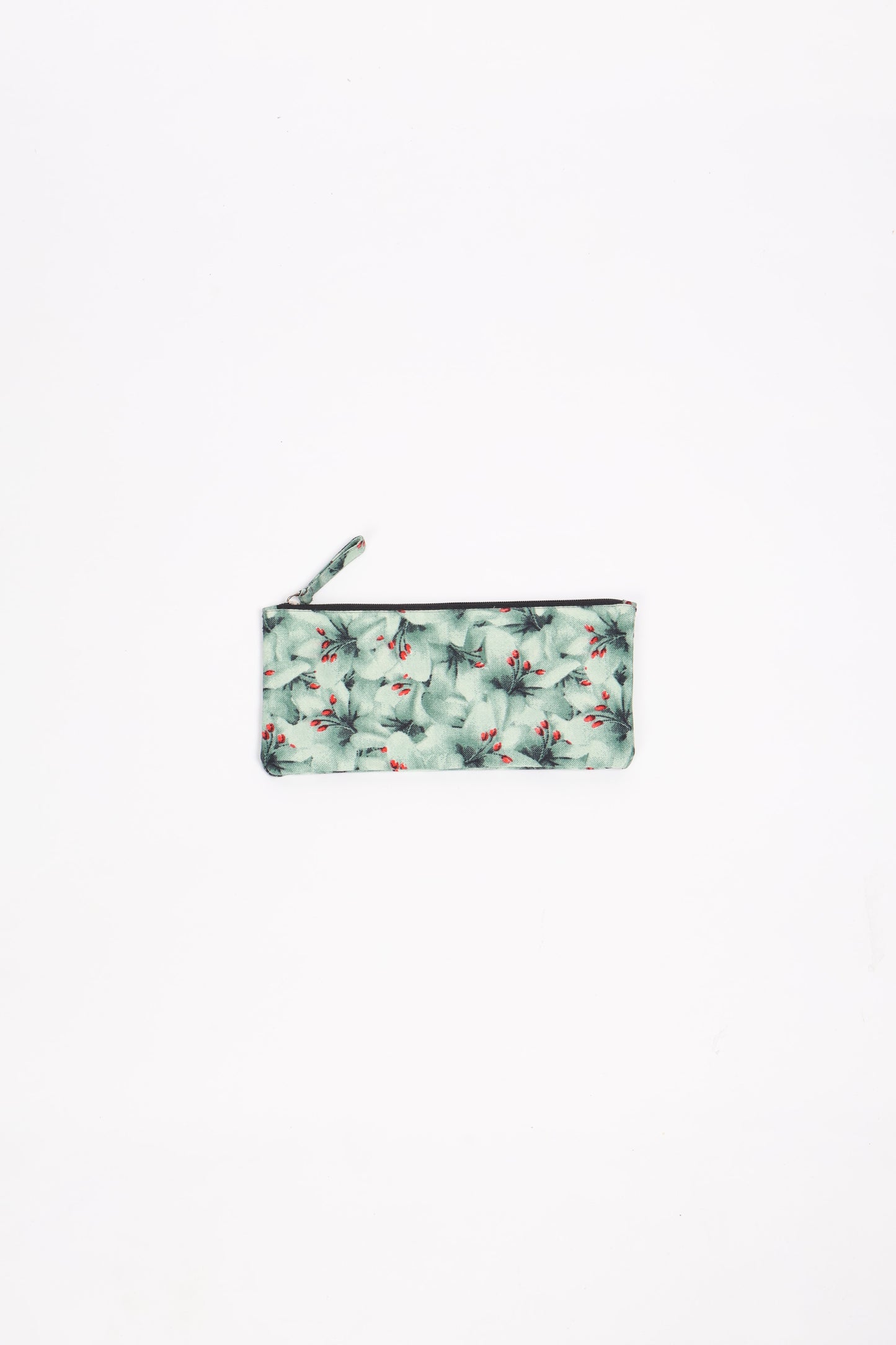 Eco-conscious quilted pencil pouch with waterproof lining made from upcycled garments, reflecting the values of circular fashion, carbon neutral fashion, and repurposed clothing. A perfect example of green fashion and sustainable women's clothing.