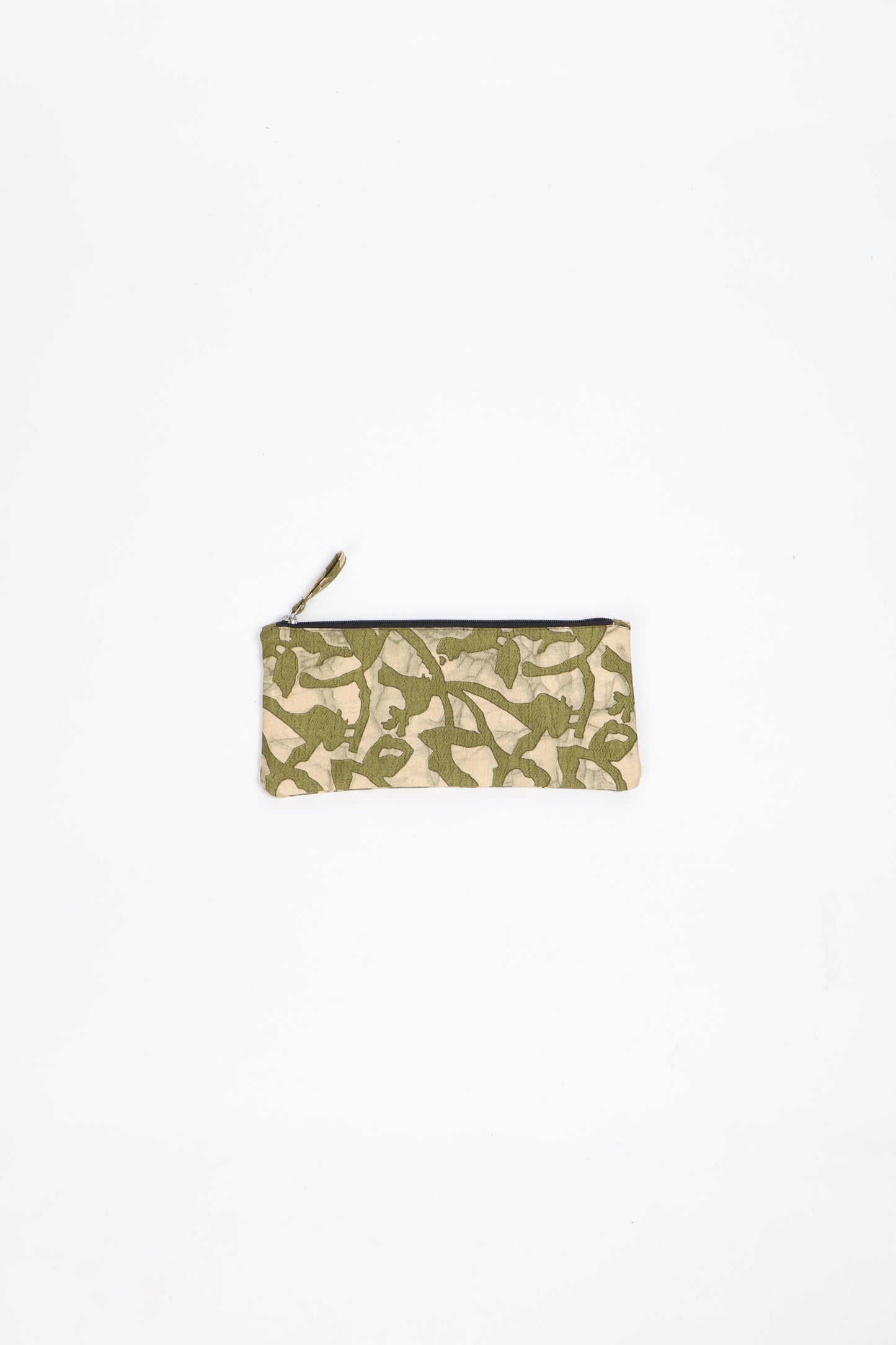 Eco-conscious quilted pencil pouch with waterproof lining made from upcycled garments, reflecting the values of circular fashion, carbon neutral fashion, and repurposed clothing. A perfect example of green fashion and sustainable women's clothing.