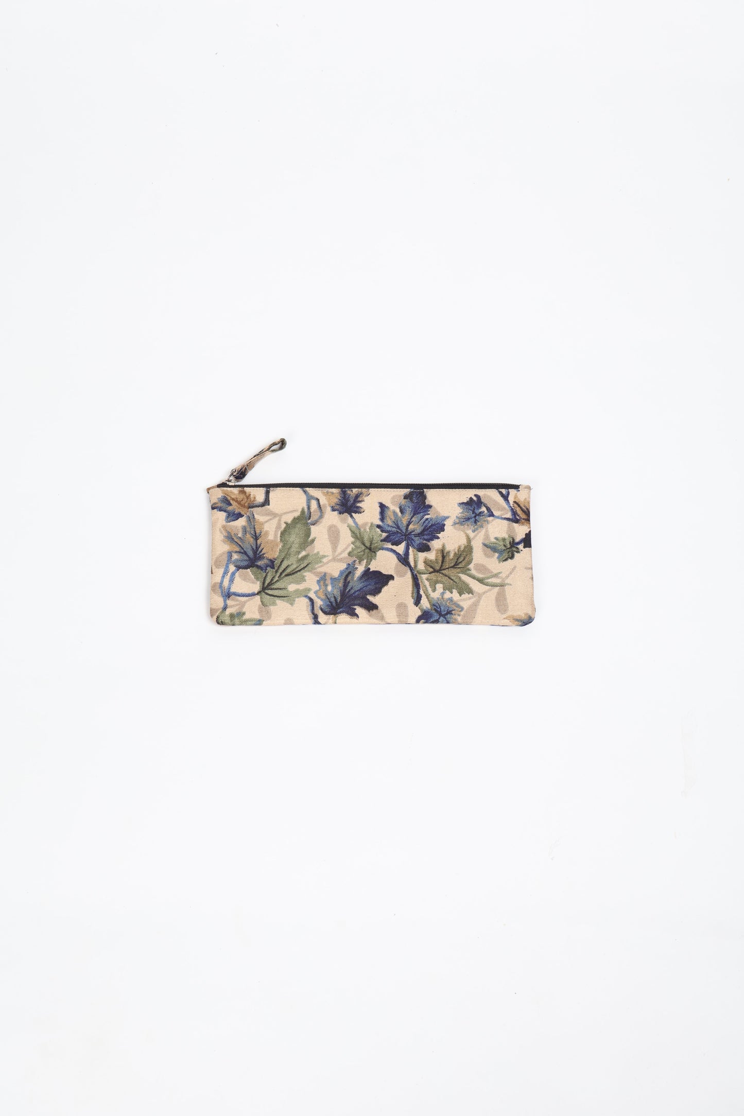 Eco-conscious quilted pencil pouch with waterproof lining made from upcycled garments, reflecting the values of circular fashion, carbon neutral fashion, and repurposed clothing. A perfect example of green fashion and sustainable women's clothing.