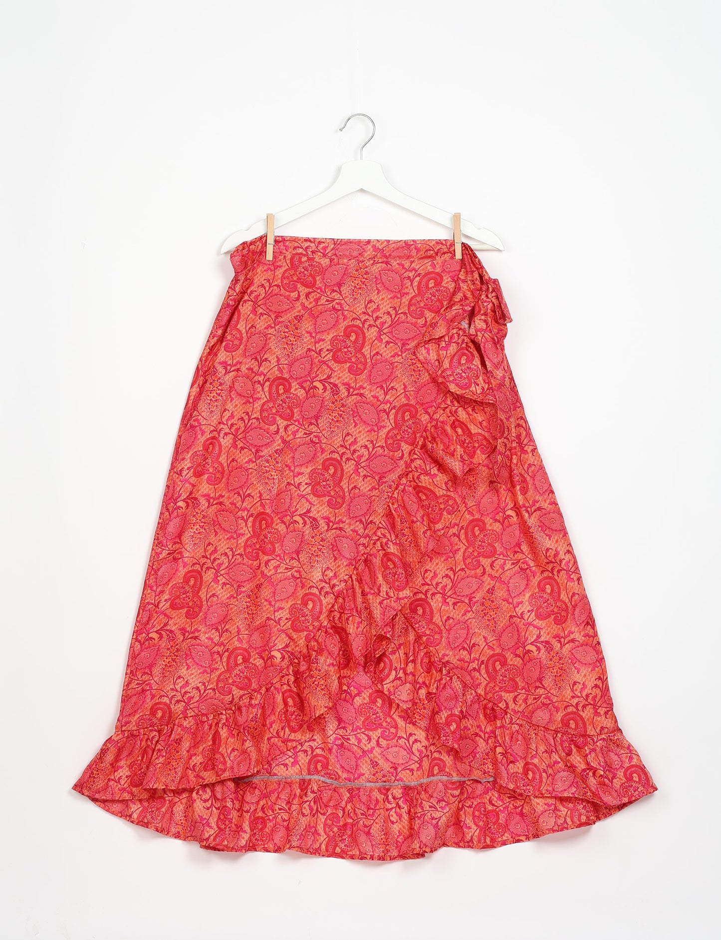 Frill Skirt Set made from recycled materials, highlighting sustainable fashion and fair trade practices. Features a ruffled wraparound skirt and a string-back top, symbolizing upcycled women's clothing and eco-friendly fashion.