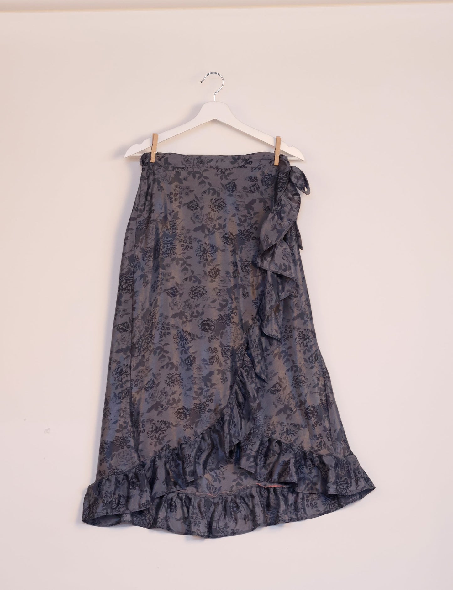 Frill Skirt Set made from recycled materials, highlighting sustainable fashion and fair trade practices. Features a ruffled wraparound skirt and a string-back top, symbolizing upcycled women's clothing and eco-friendly fashion.