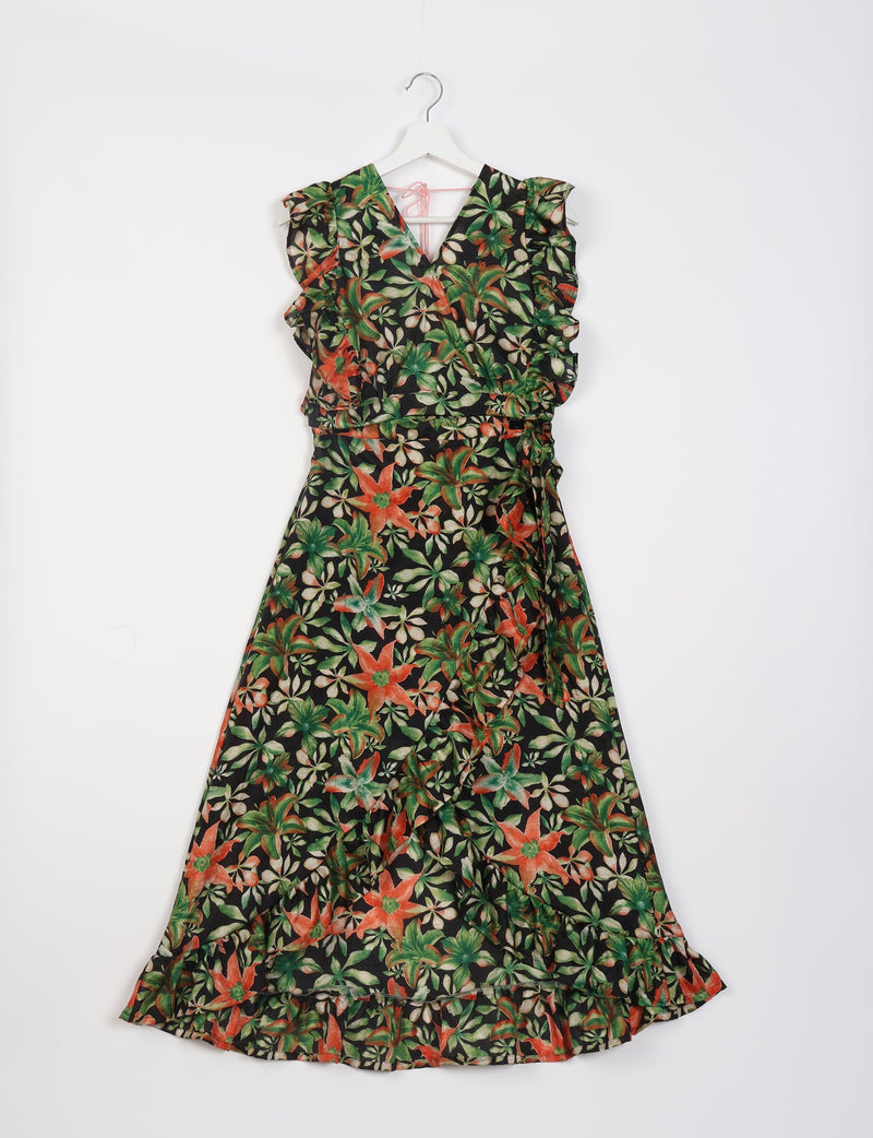 Black floral frill skirt set with green and orange flowers, ruffled sleeves, V-neck, and ruffle hem, hanging on white hanger