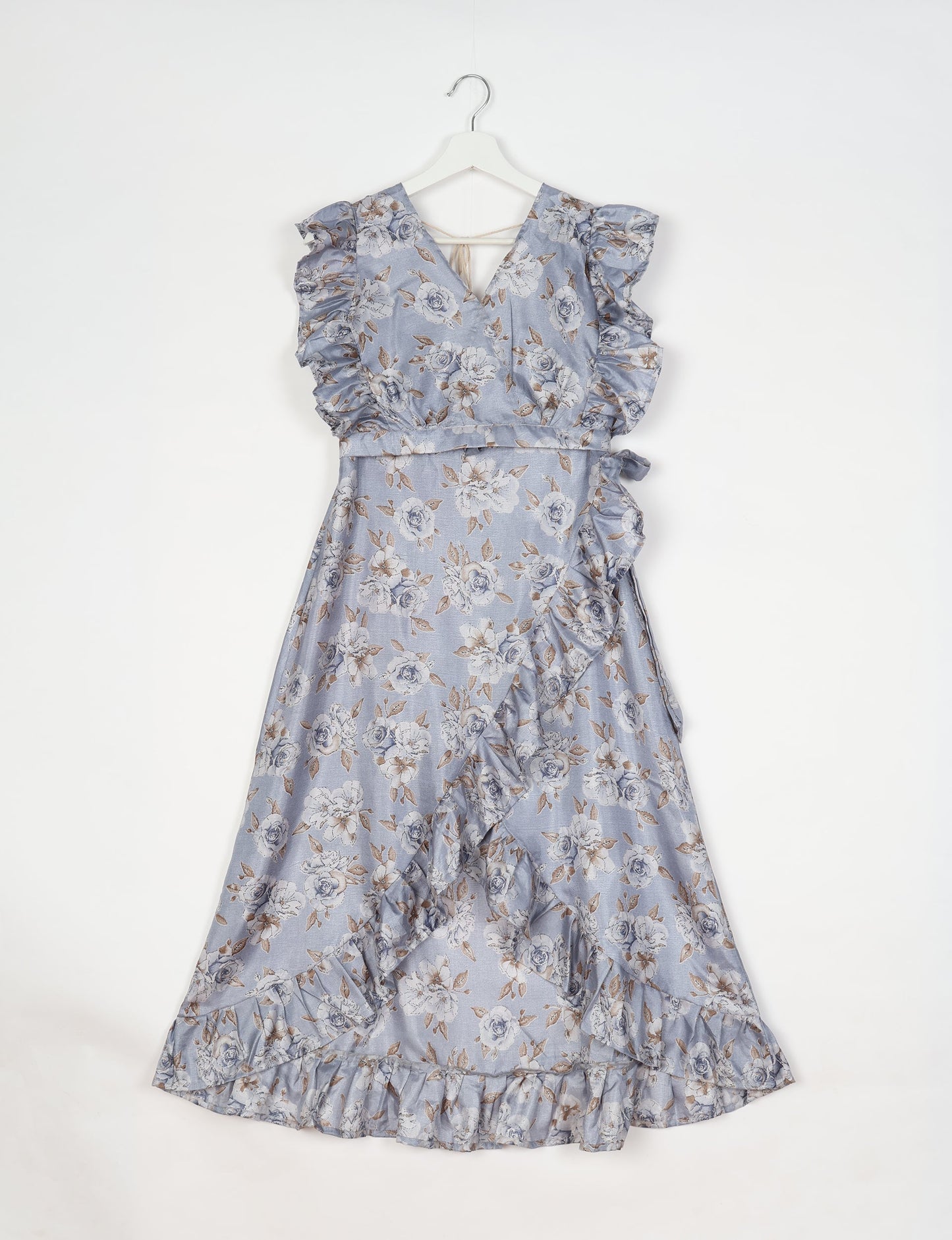 Frill Skirt Set made from recycled materials, highlighting sustainable fashion and fair trade practices. Features a ruffled wraparound skirt and a string-back top, symbolizing upcycled women's clothing and eco-friendly fashion.