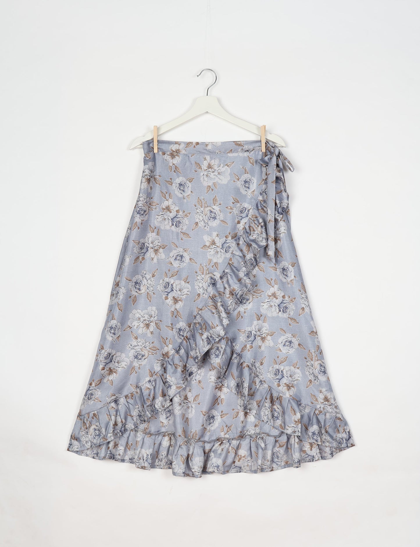 Frill Skirt Set made from recycled materials, highlighting sustainable fashion and fair trade practices. Features a ruffled wraparound skirt and a string-back top, symbolizing upcycled women's clothing and eco-friendly fashion.