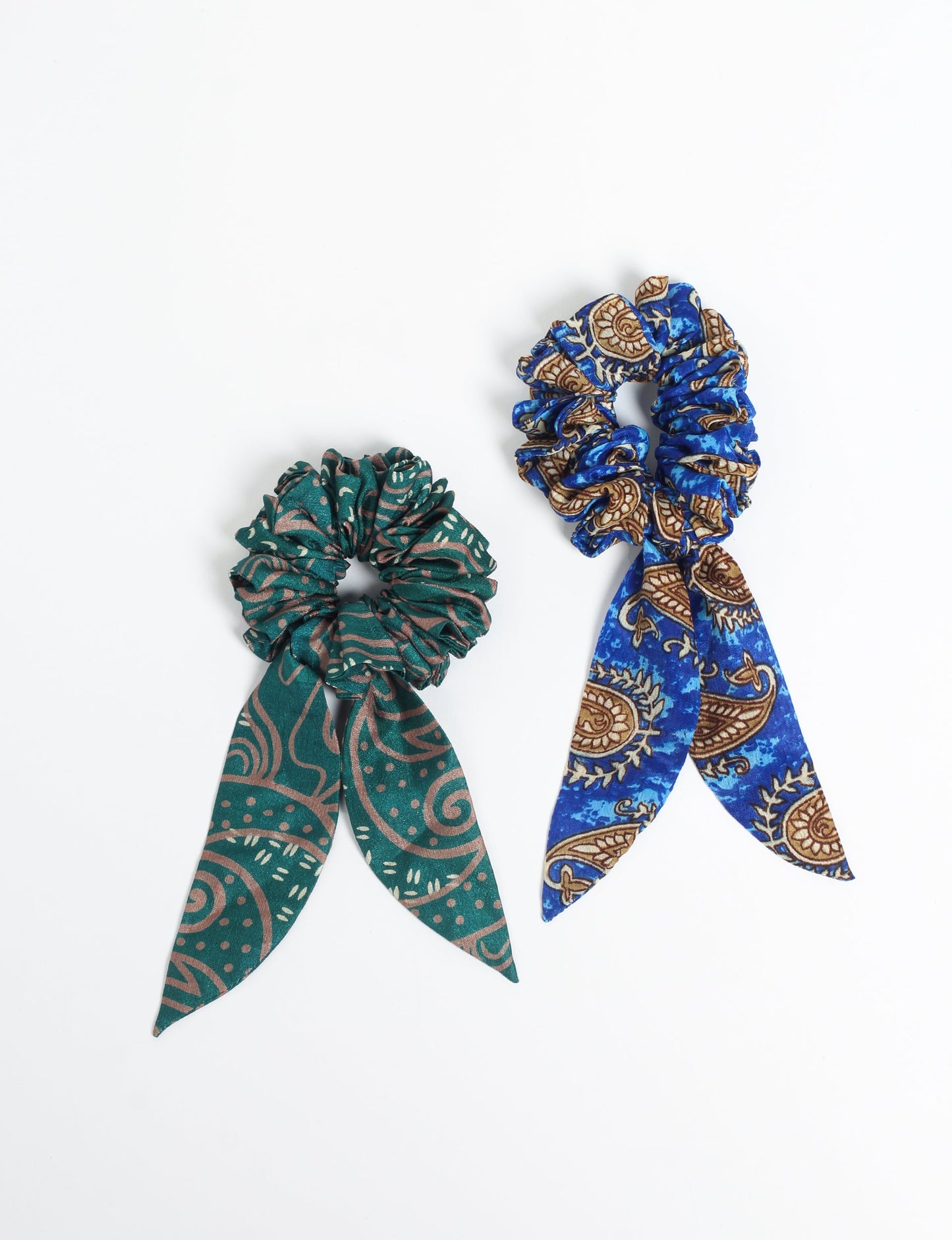 Colorful Tail Scrunchy made from sustainable, upcycled women's clothing. An eco-friendly fashion accessory promoting green fashion, recycled clothing, and ethical fashion choices.