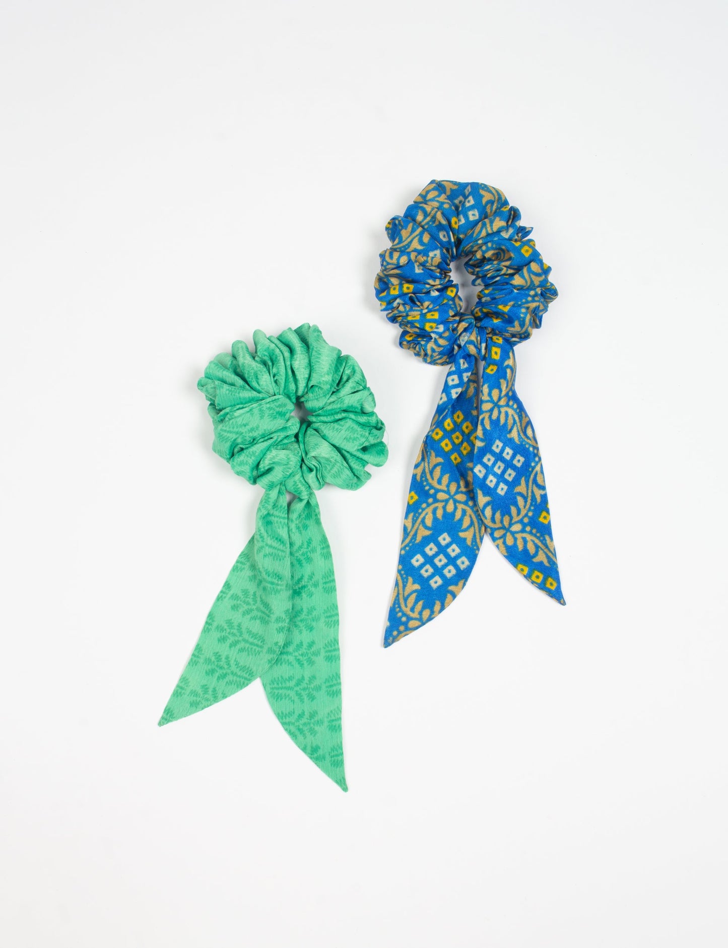 Colorful Tail Scrunchy made from sustainable, upcycled women's clothing. An eco-friendly fashion accessory promoting green fashion, recycled clothing, and ethical fashion choices.