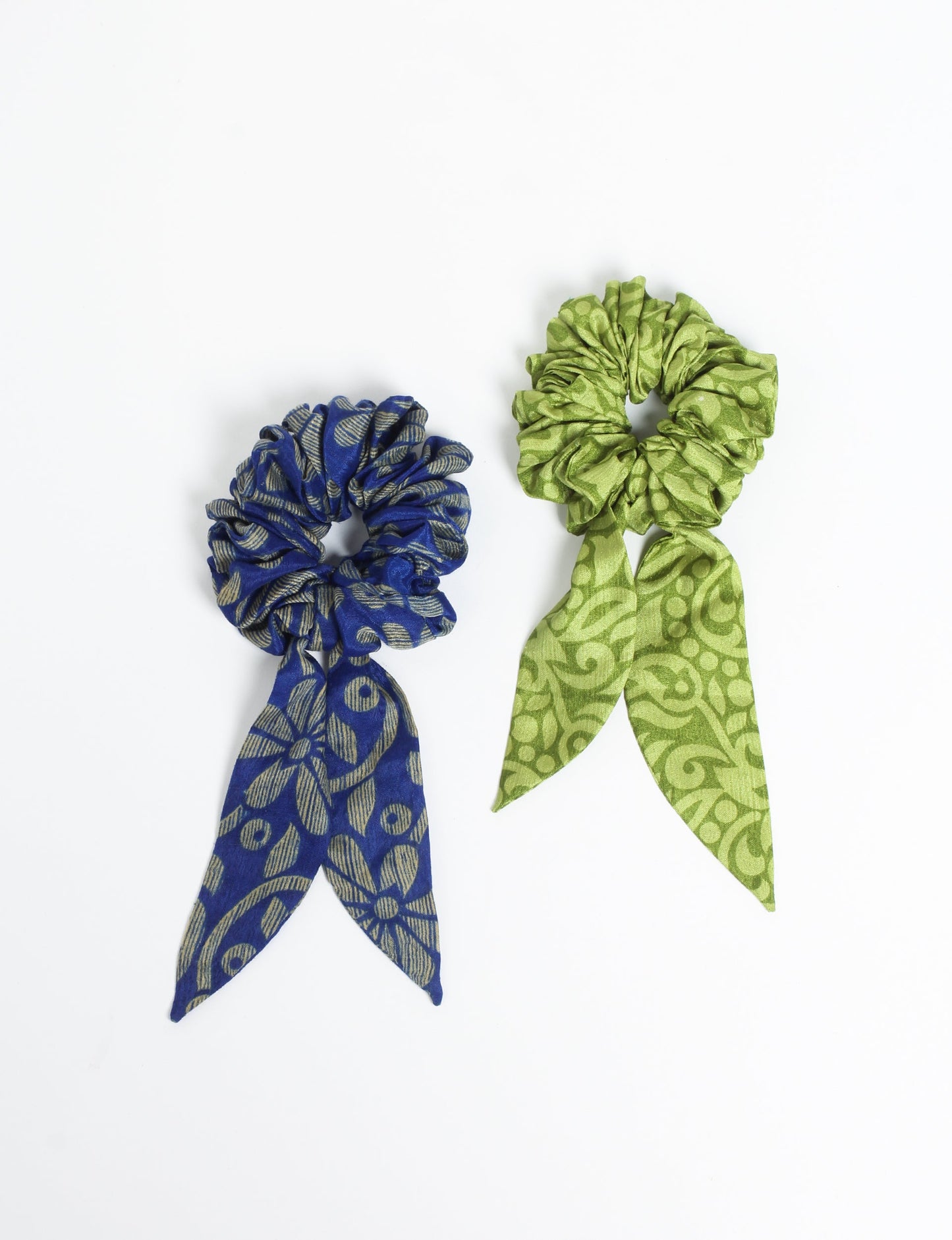 Colorful Tail Scrunchy made from sustainable, upcycled women's clothing. An eco-friendly fashion accessory promoting green fashion, recycled clothing, and ethical fashion choices.