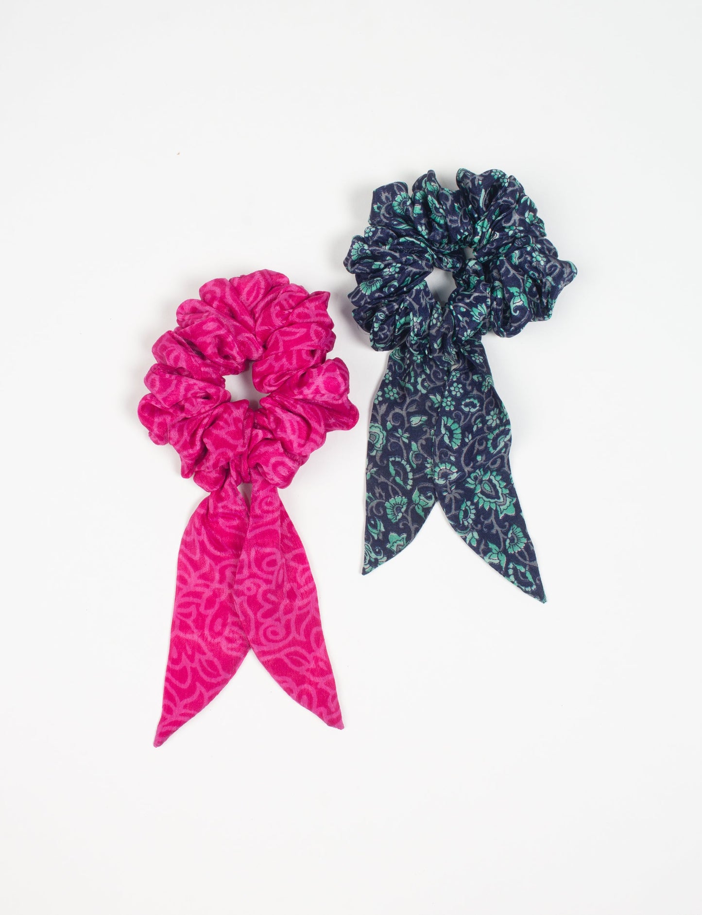 Colorful Tail Scrunchy made from sustainable, upcycled women's clothing. An eco-friendly fashion accessory promoting green fashion, recycled clothing, and ethical fashion choices.