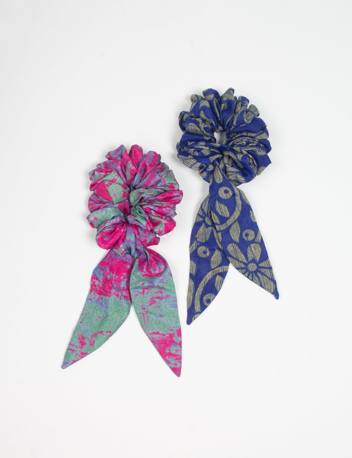 Colorful Tail Scrunchy made from sustainable, upcycled women's clothing. An eco-friendly fashion accessory promoting green fashion, recycled clothing, and ethical fashion choices.