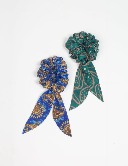 Colorful Tail Scrunchy made from sustainable, upcycled women's clothing. An eco-friendly fashion accessory promoting green fashion, recycled clothing, and ethical fashion choices.