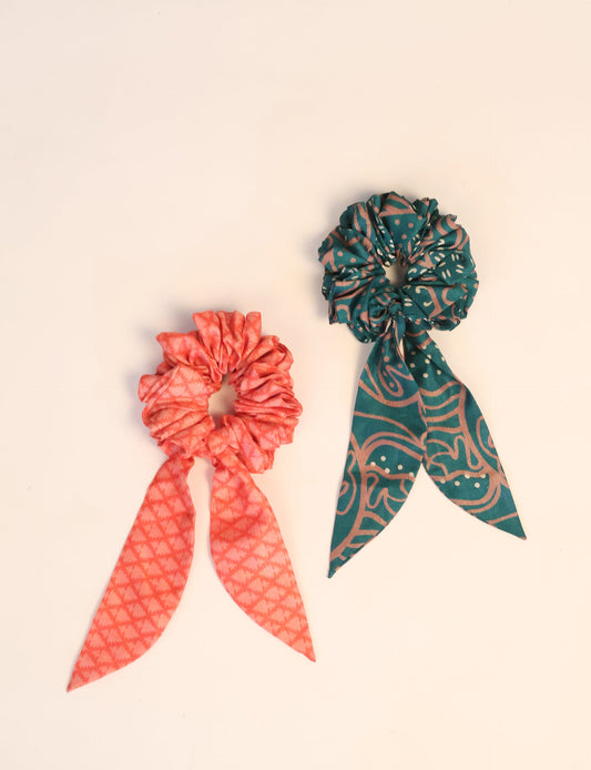 Colorful Tail Scrunchy made from sustainable, upcycled women's clothing. An eco-friendly fashion accessory promoting green fashion, recycled clothing, and ethical fashion choices.