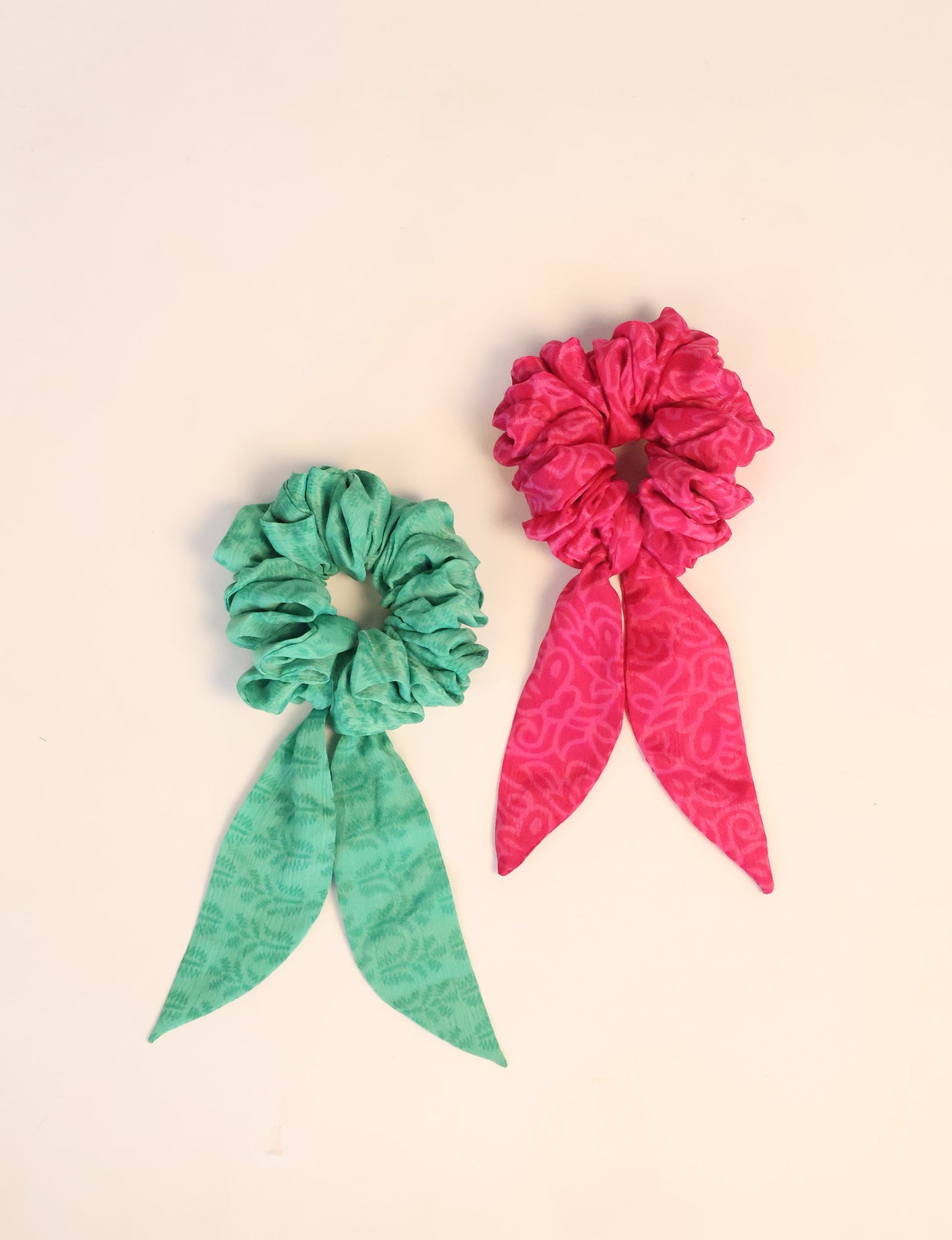 Colorful Tail Scrunchy made from sustainable, upcycled women's clothing. An eco-friendly fashion accessory promoting green fashion, recycled clothing, and ethical fashion choices.