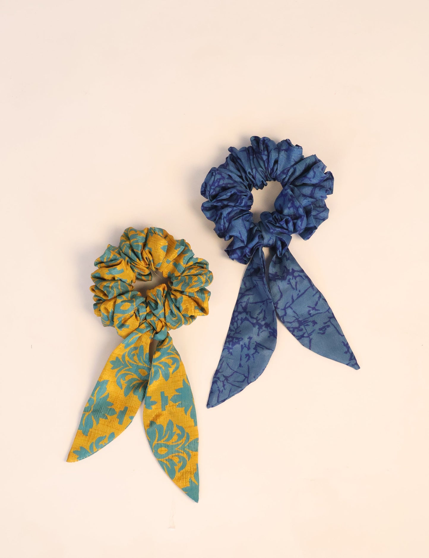 Colorful Tail Scrunchy made from sustainable, upcycled women's clothing. An eco-friendly fashion accessory promoting green fashion, recycled clothing, and ethical fashion choices.