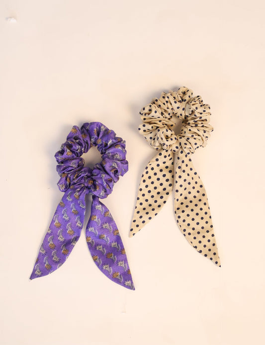 Colorful Tail Scrunchy made from sustainable, upcycled women's clothing. An eco-friendly fashion accessory promoting green fashion, recycled clothing, and ethical fashion choices.