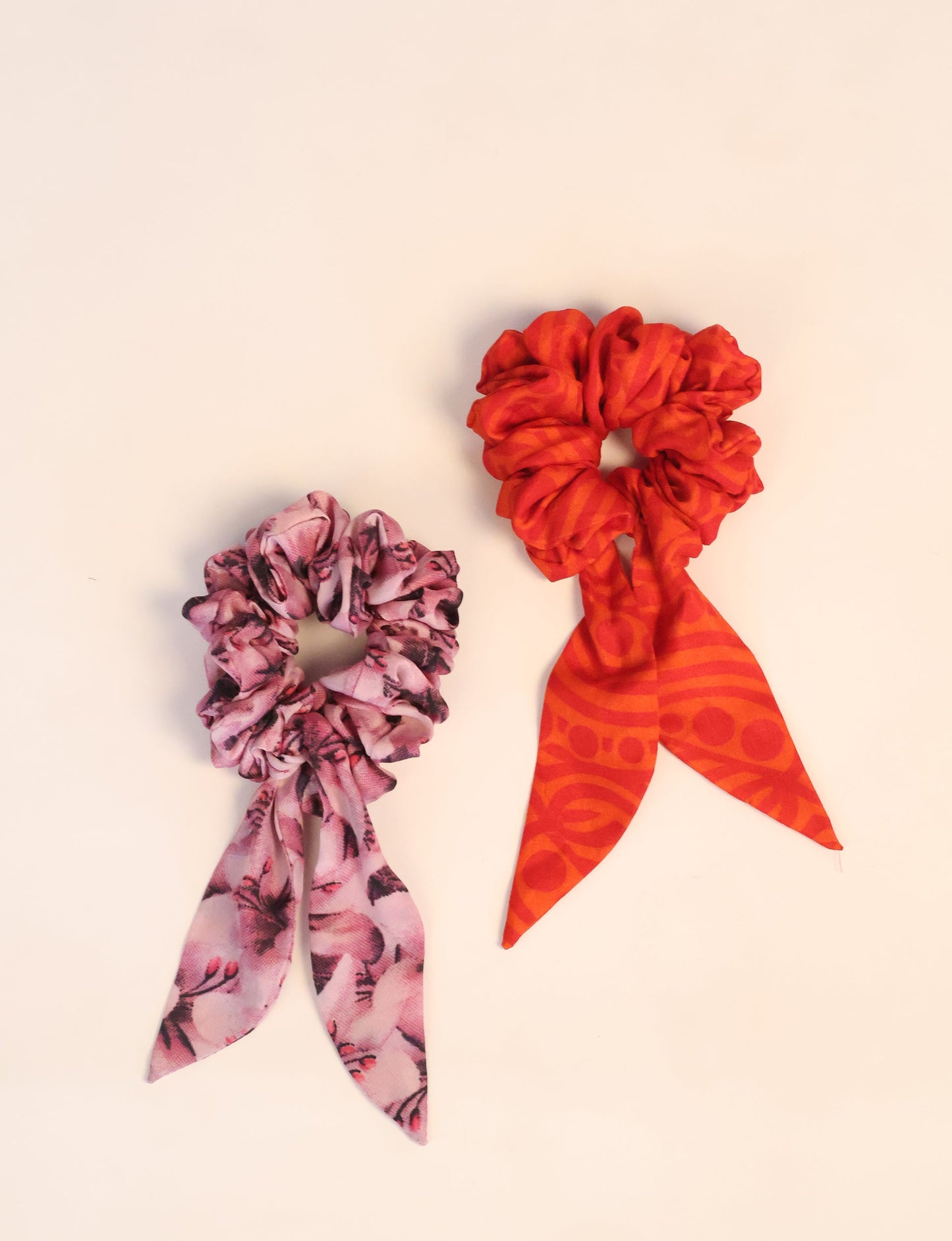 Colorful Tail Scrunchy made from sustainable, upcycled women's clothing. An eco-friendly fashion accessory promoting green fashion, recycled clothing, and ethical fashion choices.