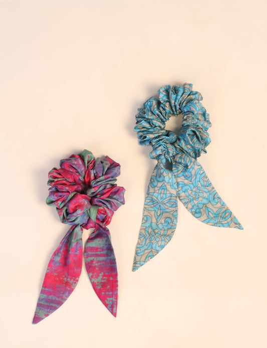 Colorful Tail Scrunchy made from sustainable, upcycled women's clothing. An eco-friendly fashion accessory promoting green fashion, recycled clothing, and ethical fashion choices.