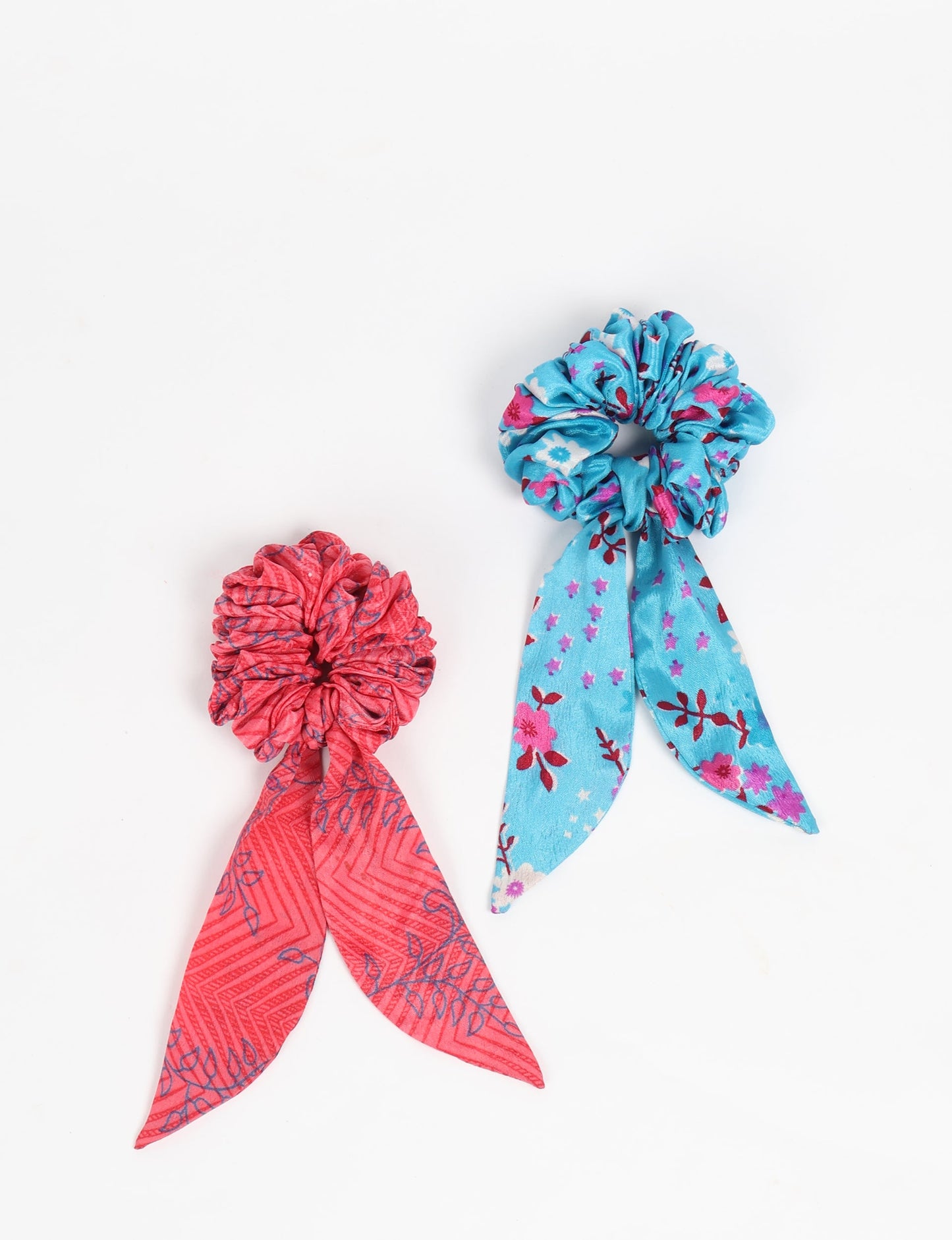 Colorful Tail Scrunchy made from sustainable, upcycled women's clothing. An eco-friendly fashion accessory promoting green fashion, recycled clothing, and ethical fashion choices.