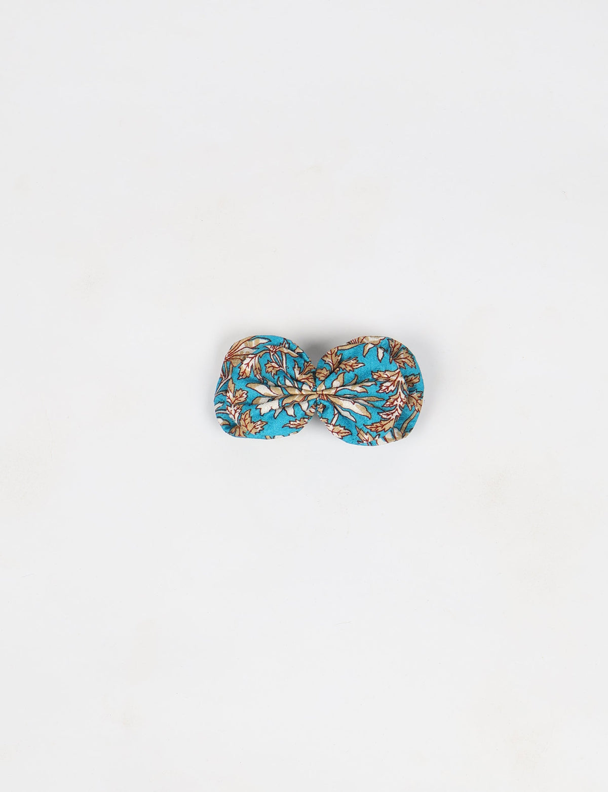 Stylish upcycled women's hairclip made from eco friendly products, reflecting the essence of upcycling fashion, ethical clothing, and sustainable apparel—ideal for those embracing slow fashion and earth friendly clothing.