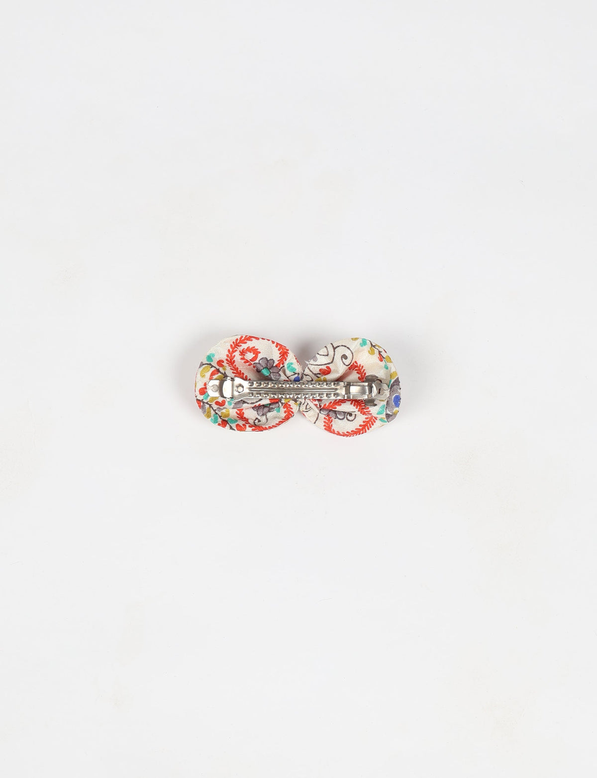Stylish upcycled women's hairclip made from eco friendly products, reflecting the essence of upcycling fashion, ethical clothing, and sustainable apparel—ideal for those embracing slow fashion and earth friendly clothing.