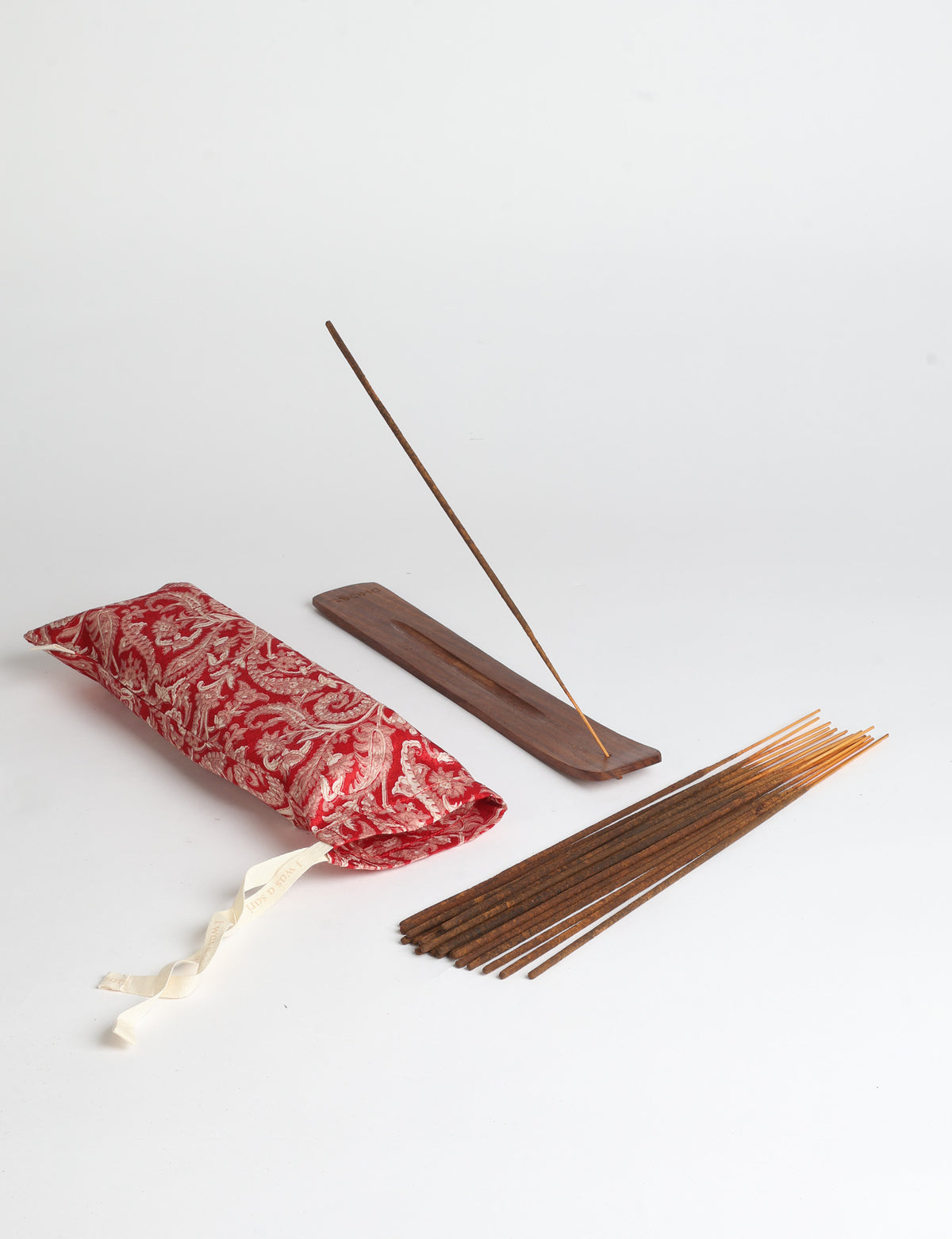 Incense stick set with wooden holder and repurposed sari fabric pouch, including 40 incense sticks.