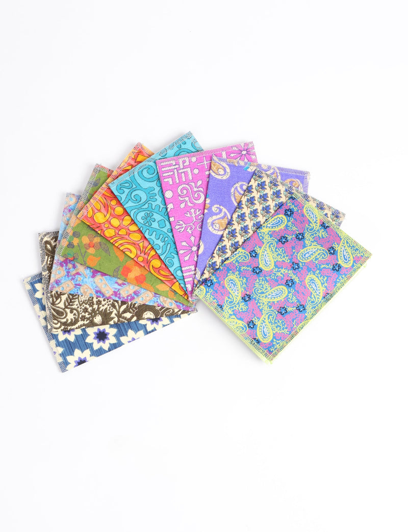 Set of 10 folded postcards with colorful, intricate floral and paisley patterns, shown fanned out on white background