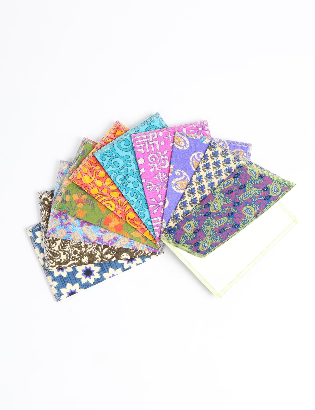 Set of 10 folded postcards with colorful, patterned fabric designs fanned out on a white background